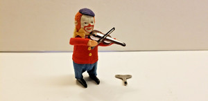 Schuco Solisto Clown playing the Violin,  Windup Tin Toy, with key, works well.