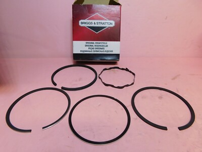 GENUINE BRIGGS AND STRATTON PISTON RING STD # 299743  ---  BOX 1718 Q