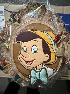 Disney Loungefly:
Disney Pinocchio Cameo Mini Backpack Pinocchio Cameo Mini Backpack main image 3