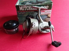 VERY GOOD LIGHTLY USED BOXED MITCHELL 300 CENTURY 50TH ANNIVERSARY SPINNING REEL