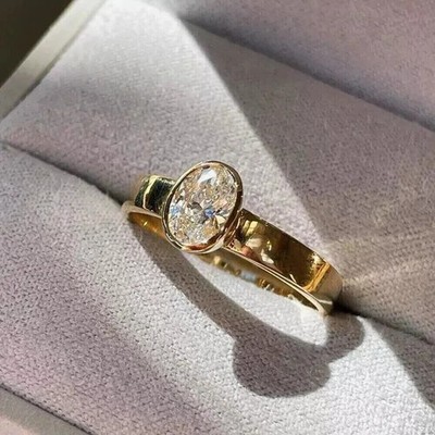 2Ct Oval Cut Lab-Created Diamond Women's Bezel Style Ring 14K Yellow Gold Plated