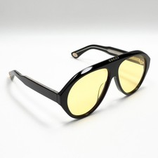 Gafas de sol Gucci GG0479S aviador marco negro lentes amarillas unisex Italia 60-16-145