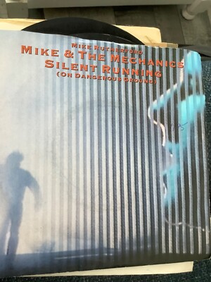 Mike + The Mechanics.   Silent Running     7'' Vinyl.  1985. WEA  records