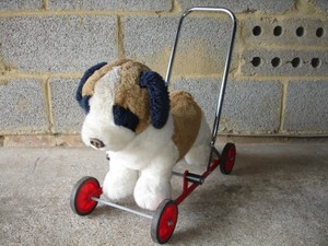 vintage push along dog on wheels