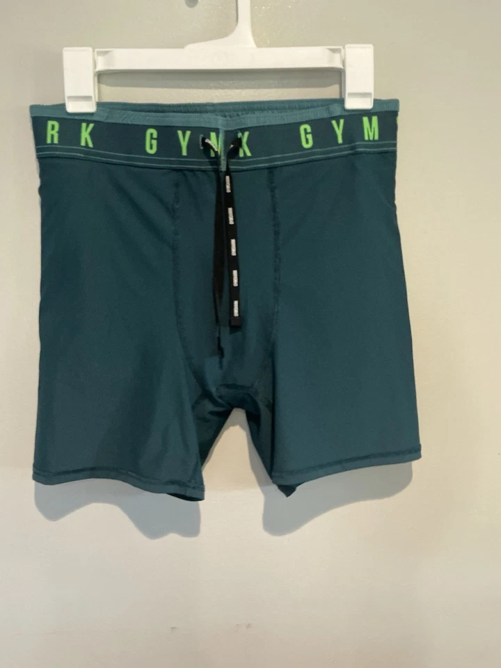 Pantalones Cortos de Entrenamiento Gymshark Mujer Medianos Verde Cintura Elástica Poliéster Foto 4 de 4