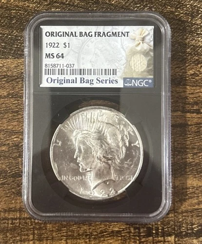 1922 Peace Silver Dollar W Original Bag Fragment NGC Ms 64 Black Core.
