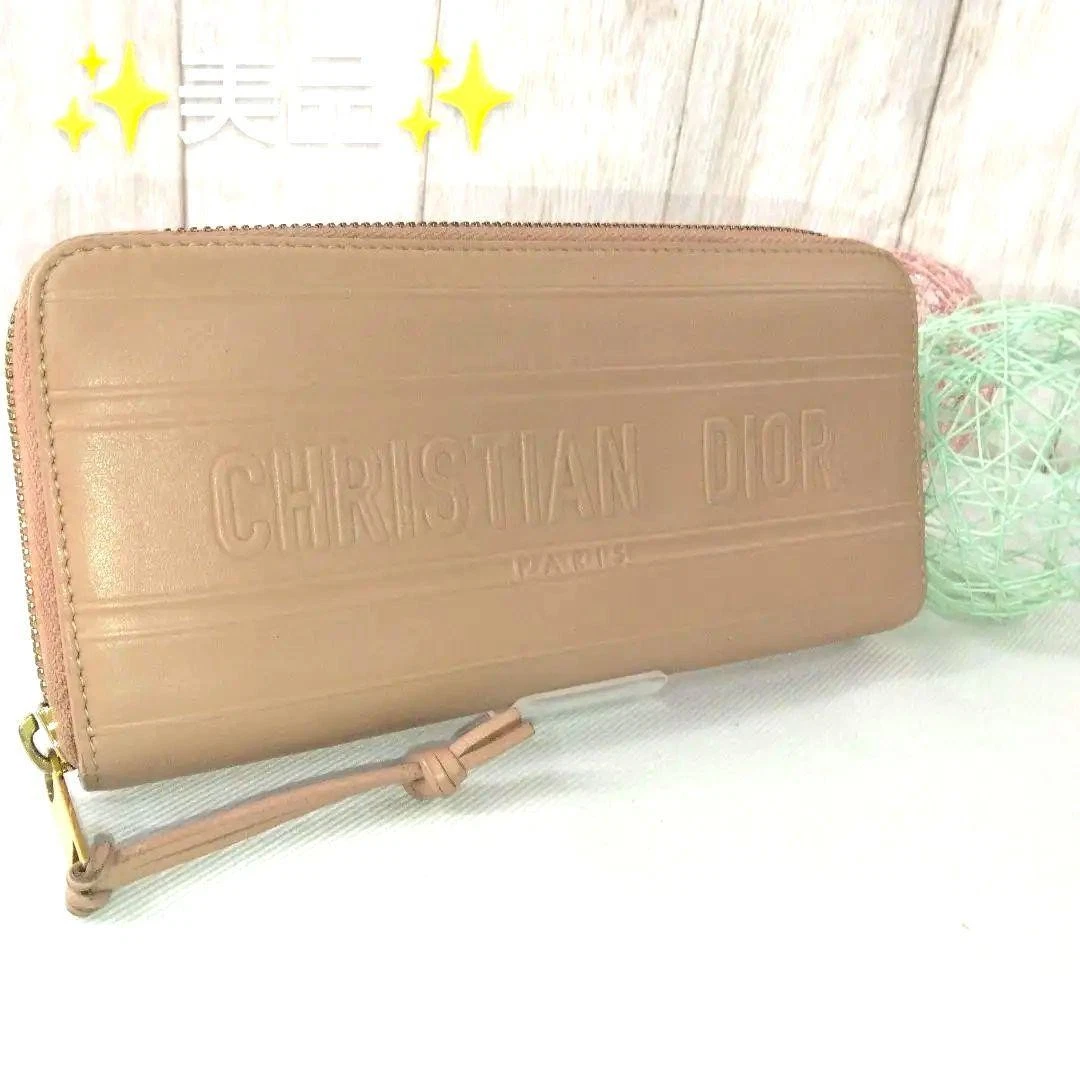 Portefeuille long Christian Dior logo en relief fermeture éclair ronde cuir rose