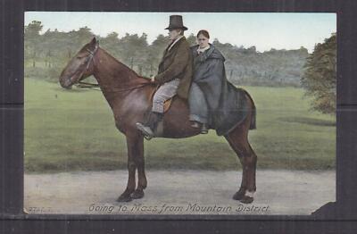 GOING TO MASS FROM MOUNTAIN DISTRICT, MAN & WOMAN ON  HORESEBACK, c1910 ppc.