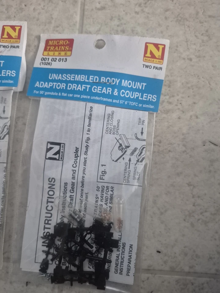 Lot of 2 N Scale MICRO TRAINS 001 02 013 (1026) Body Mount Adp Draft &Cplers - Image 2 of 4