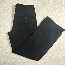 Pantalones elásticos Levi’s 526 corte bota delgado para mujer 14 negros de pana
