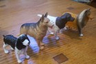 LOT OF 4 AMAZING ASSORTED DOG BREED FIGURES TOYS 2"-2.25" tall 3.25"- 3.5"long — photo 1