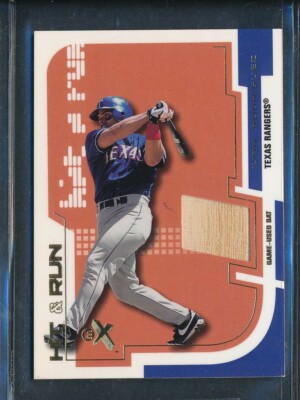 2002 Fleer Hit & Run E-X GU Bat Relic: IVAN RODRIGUEZ Rangers