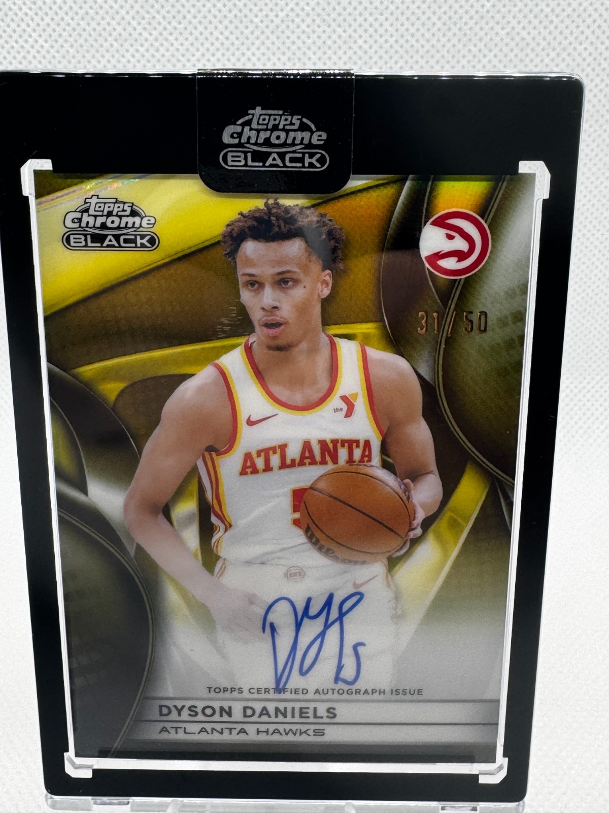 2025-26 Topps Chrome Black Dyson Daniels Gold Refractor Auto /50 AU-DDA Hawks