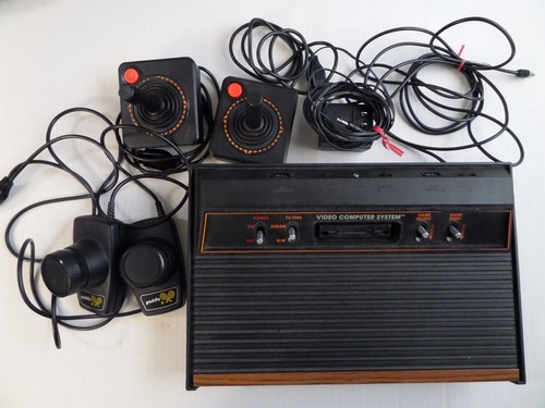 Atari 2600 (4 Switch) With 2 Joysticks, Paddles, 27 Games, Instructions, Tested - Picture 2 of 9