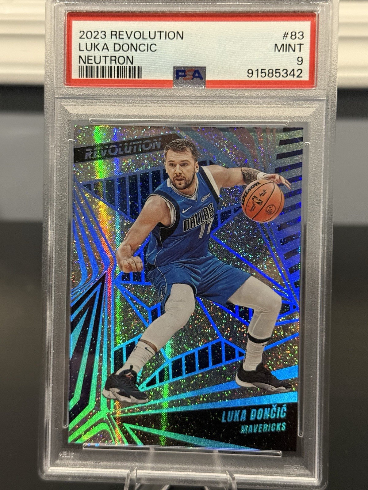 2023-24 Panini Revolution #83 Luka Doncic Neutron #/125. PSA 9
