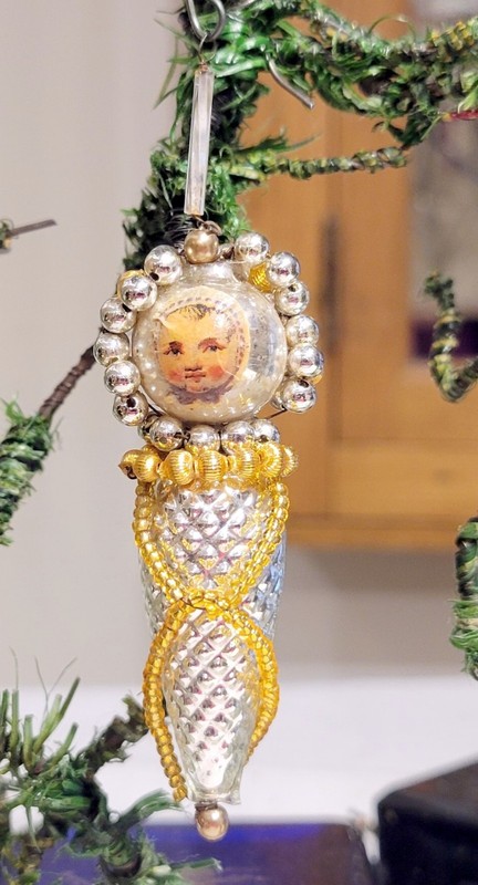 Baby in Bunting (Paper Face)Ornament. 1960s. Czech Republic. MACH Vienna Exhibit