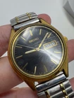 Vintage Seiko 7N43-9048 Quartz Mens Watch Black Dial Day Date Speidel Band As Is