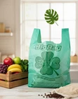 1400 Pcs Reusable Green Bio-Degradable Plastic T-Shirt Bags 11.5" x 6.5" x 21"