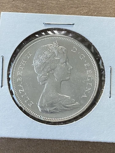 1966 Canada Silver Dollar  80% Silver.  Elizabeth II  Canoe Nice Circulated