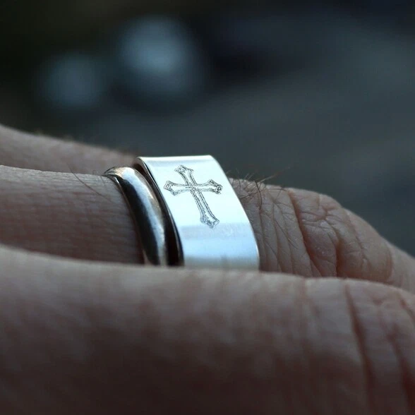 Silver ring with cross best sale engraved