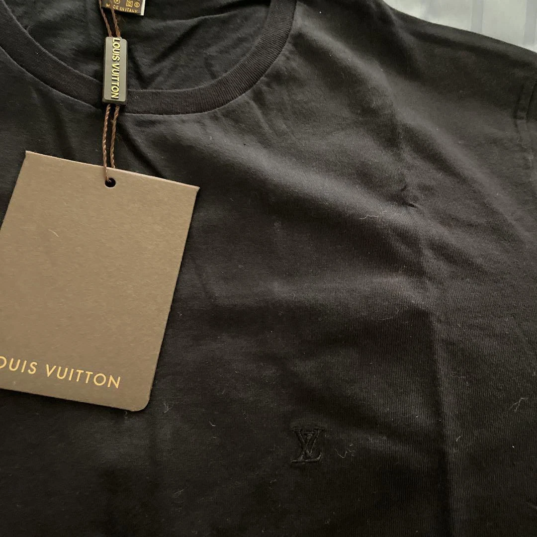 Louis Vuitton black polo with embroidered LV logo