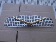 Nice 1956 Plymouth Center Grille Insert And Gold Vee Emblem