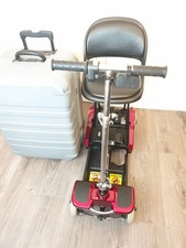 A Portable Folding Scootcase care-co Mobility Scooter