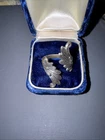 This vintage sterling silver leaf ring, adjustable in size 7