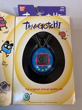 1996/1997 Bandai Original Tamagotchi Virtual Pet Blue/Yellow 1800 Sealed NIB