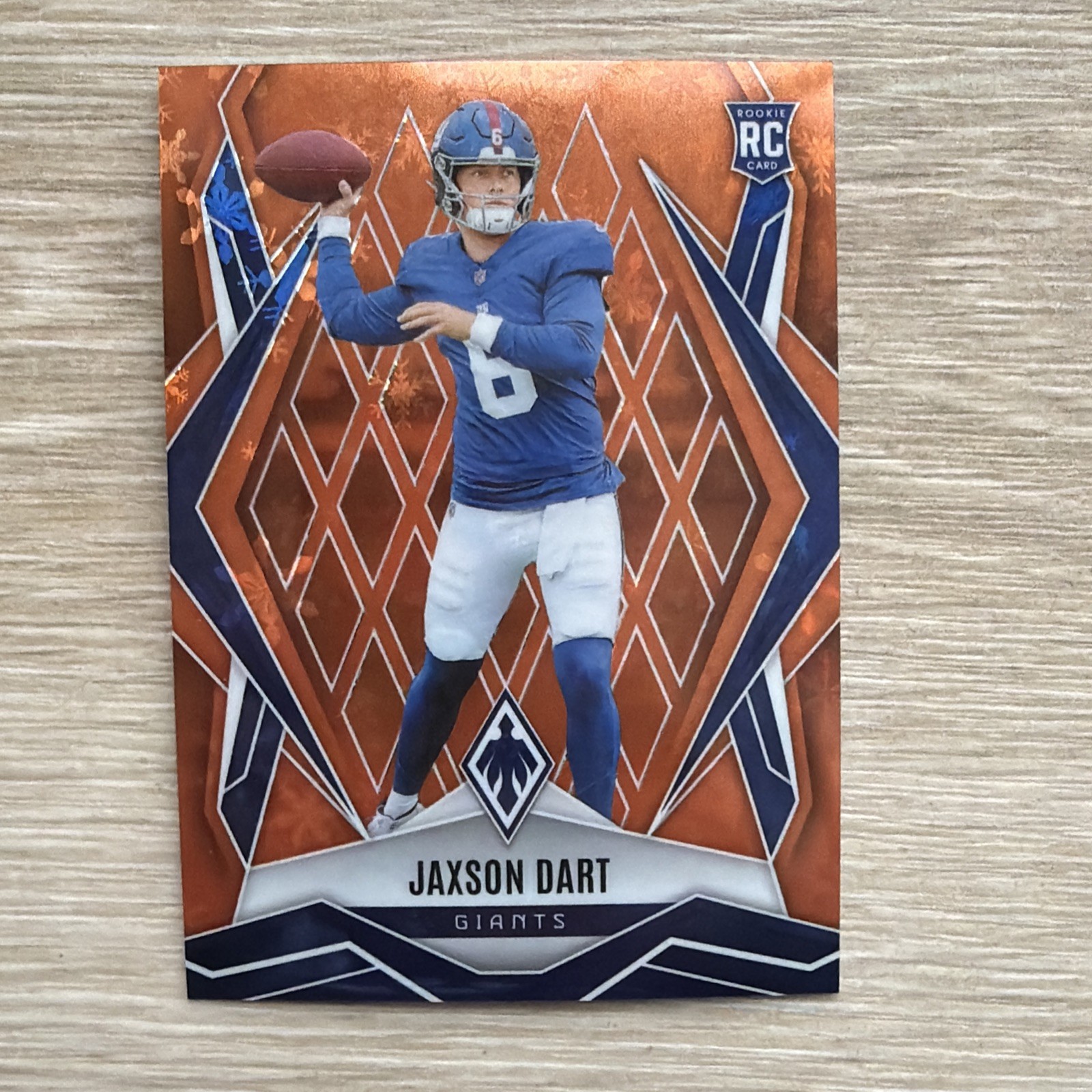 2025 Panini Phoenix Jaxson Dart Orange Winter /99 Rookie #200