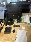 Canon EOS Rebel T7 DSLR 24.1MP w/ 18-55mm IS Lens, Charger & Bag — photo 1