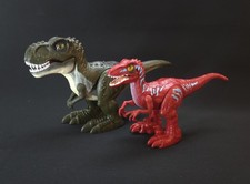 See video  Robo Alive ZURU Attacking T-Rex green  Rampaging Raptor red 