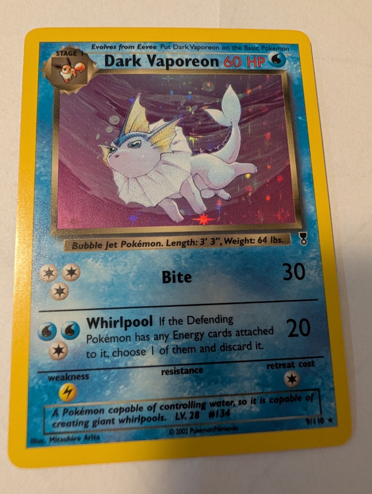 dark vaporeon pokemon card value SWSH Black Star Promos choose 1 of them and discard it. Dark Vaporeon 2002 Legendary Collection