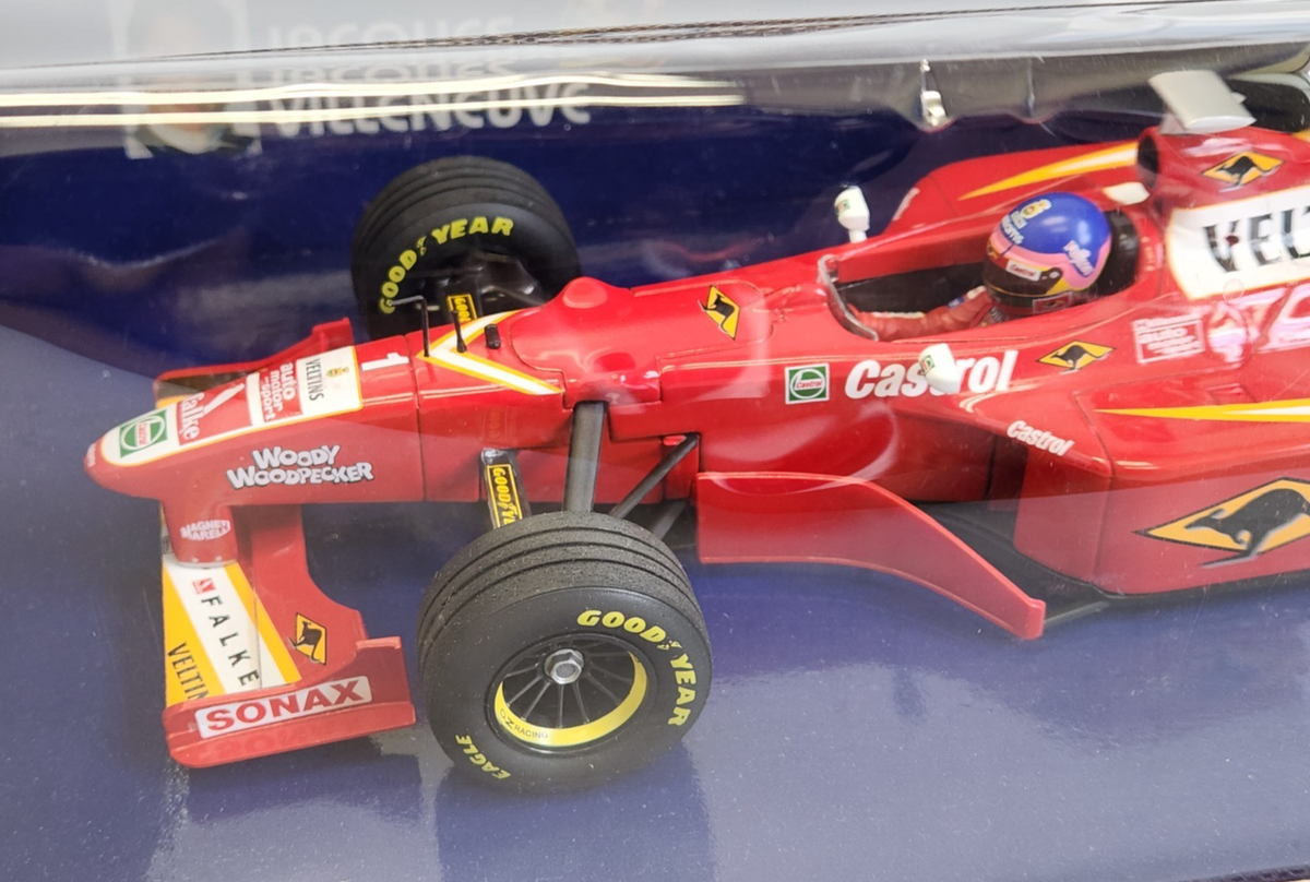 FIGURINE 1/18 JACQUES VILLENEUVE VROOM NOT PEINT MATTEL MINICHAMPS QUARTZO