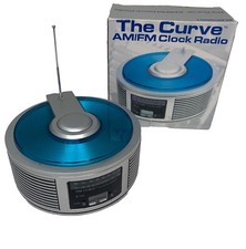 Suntone 2004 The Curve AM/FM Radio Battery Operated Model ELEC9951 Takes 4 AA
