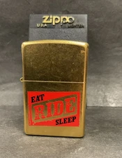 NOS 2004 Zippo Marlboro “Eat Ride Sleep” With Box Sealed Brass Color Lighter￼