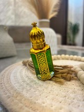 Luxury Arabian Oud Perfume Oil in Elegant Gold Green Crystal Attar Bottle