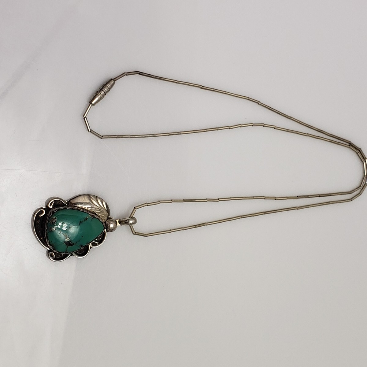 Navajo Signed Herbert Tsosie Sterling Silver Turquoise Pendant