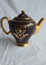 Tetera Hall McCormick China negra con oro