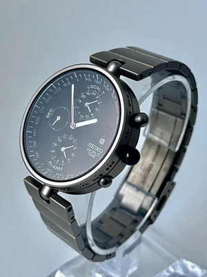 SEIKO 5T52-0010 Hora Mundial Titanio MITSUBISHI 130º - Vendedor del Reino Unido - Imagen 1 de 4