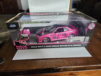 ミニカー Hello Kitty 2002 Nissan Skyline GT-R Jada Toys 1/24 2002 Nissan Skyline GT-R (BNR34) with Hello