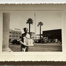 Vintage B W Snapshot Photograph Handsome Soldier Holding Newspaper WW2