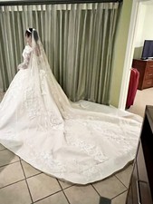 Royal wedding dress sleeve can be removed  custom made with vail and crown. 