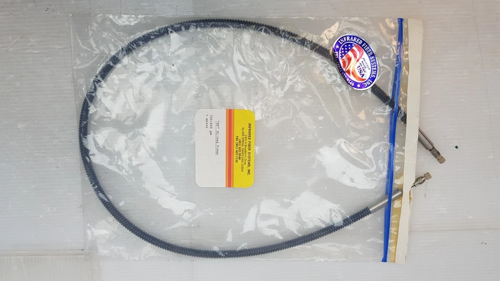 Er:YAG fiber in its original Infrared Fiber Systems bag with made in USA sticker