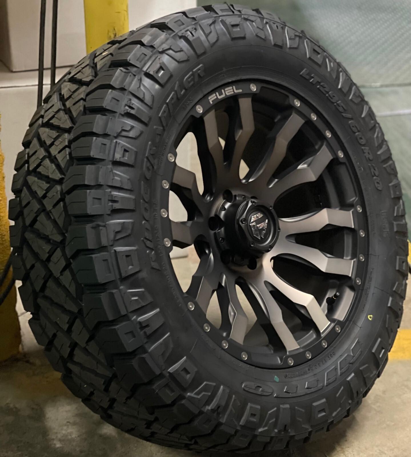 20x10 Fuel D674 Blitz Wheels 34" Nitto AT Tires 8x6.5 Dodge Ram 2500