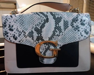 sac guess noir et rose clair très bon état - Photo 1/3