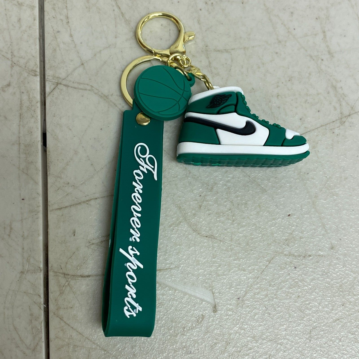 green nike keychain