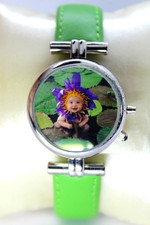 ANNE GEDDES ,MONTRE DAME ;  JAMAIS PORTEE avec BOITE ;FONCTIONNE ;PILE NEUVE.