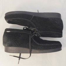 navy blue leather wallabees