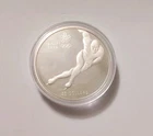 1988 Calgary speed skate $20 1985 Queen Elizabeth II 925 Silver coin